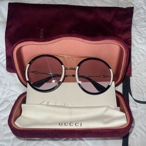 Gucci Black & White round light tint Sunglasses GG0061S